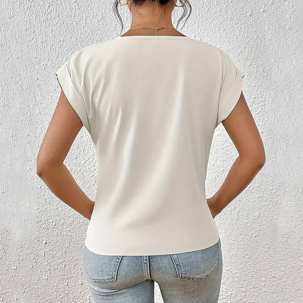 GR | Elegant, solid-color T-shirt with a V-neck and twisted hem for women