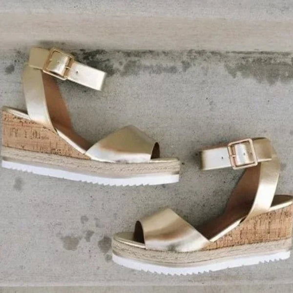 Sandals with buckled wedge heels