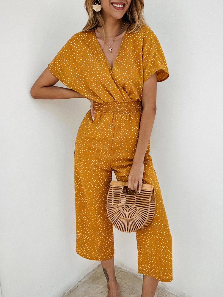 GR | Jumpsuit Make a statement with our stylish polka dot jumpsuit