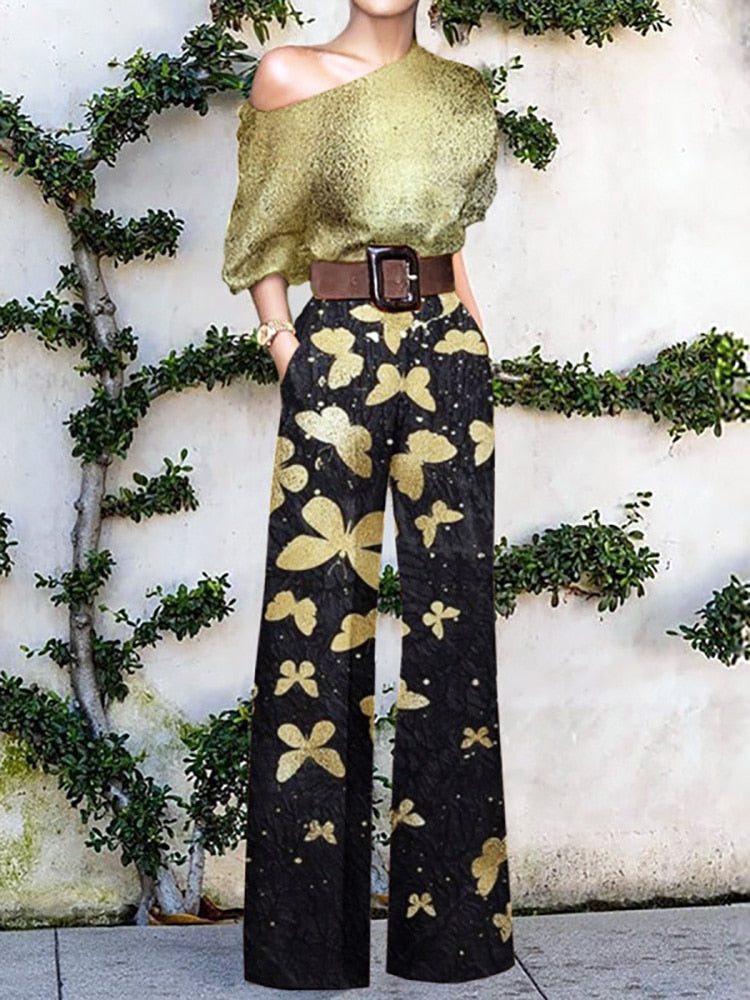 GR | Strapless jumpsuit with floral pattern