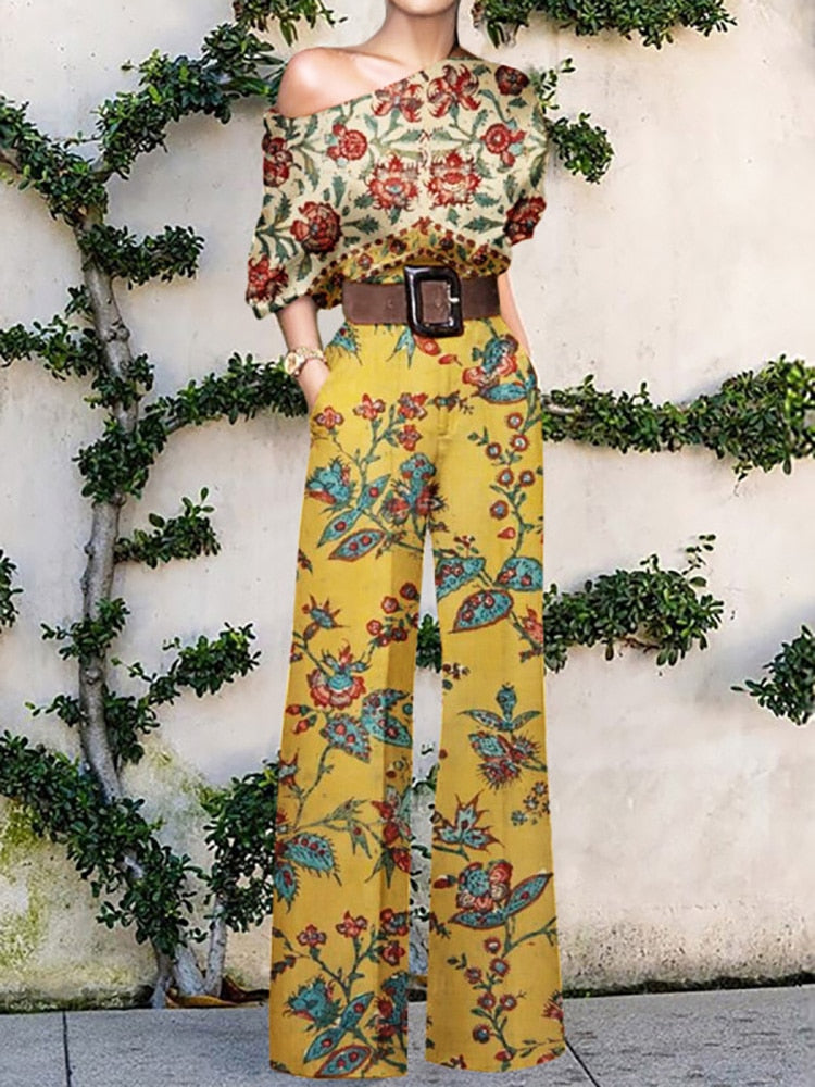 GR | Strapless jumpsuit with floral pattern