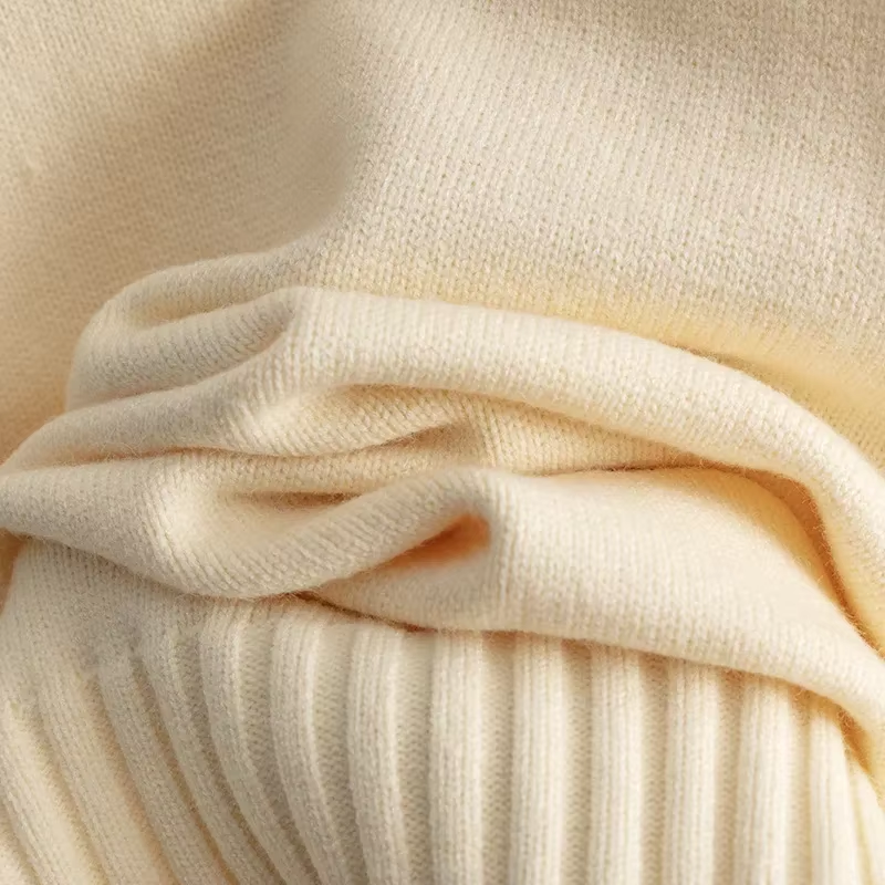 GR | Stylish set consisting of a long-sleeved sweater and straight-leg trousers 