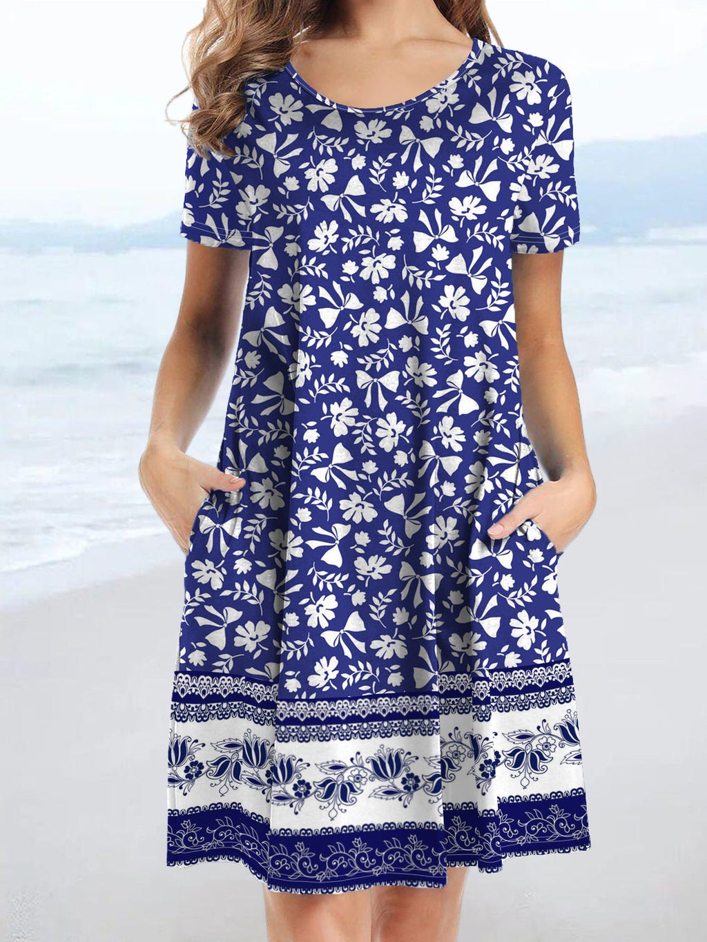 Women's casual dress with playful floral print and practical pockets, size