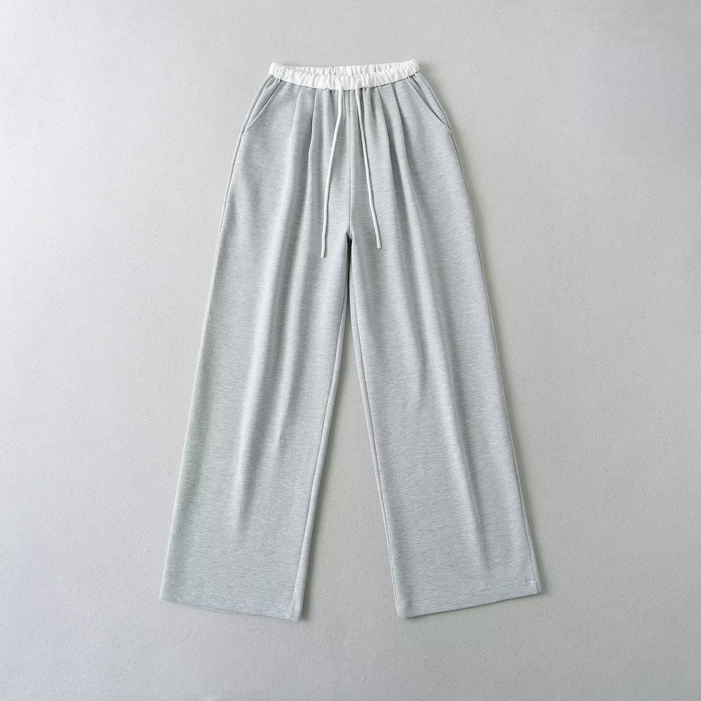 Women's comfortable sweatpants with elastic waistband and side pockets, size