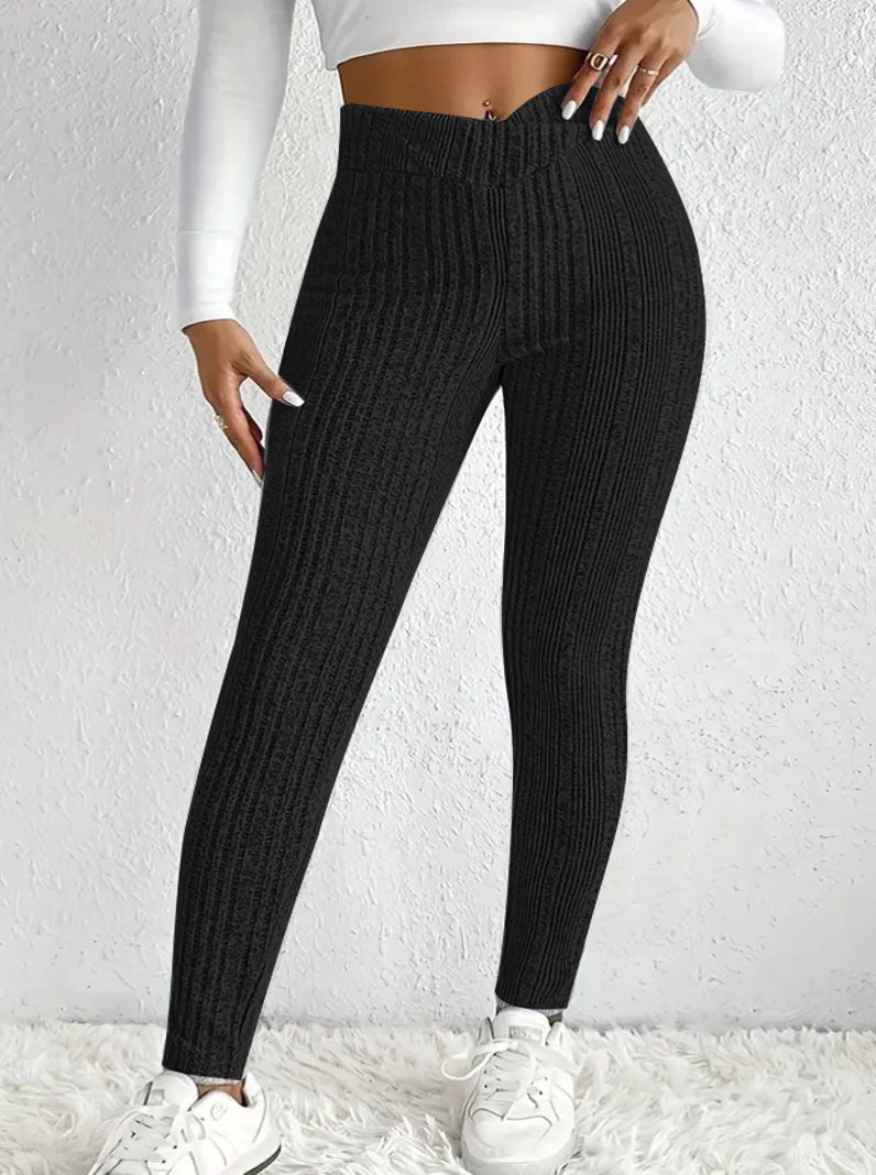 Women's close-fitting ribbed leggings made of breathable stretch material, size