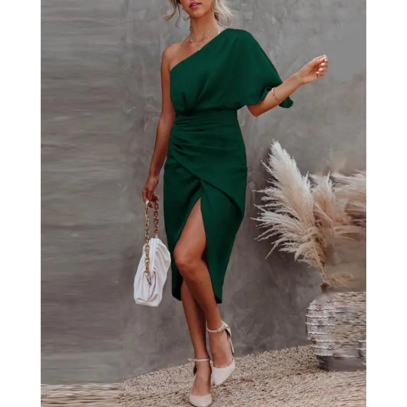 Women's chic, asymmetrical evening dress with an elegant slit and sophisticated draping, size GR