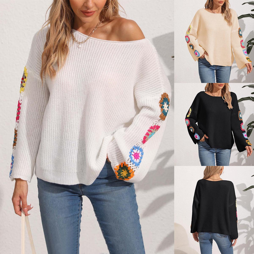 Women's elegant sweater with colorful crochet appliqués on the sleeves, size [size missing]