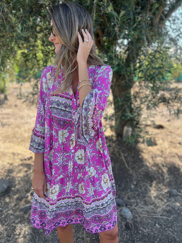 Women's boho-chic dress with floral patterns and button placket, size [size missing]
