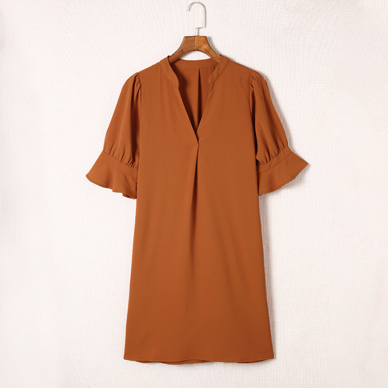 Women's elegant mini dress with a flattering V-neck and puff sleeves, size S