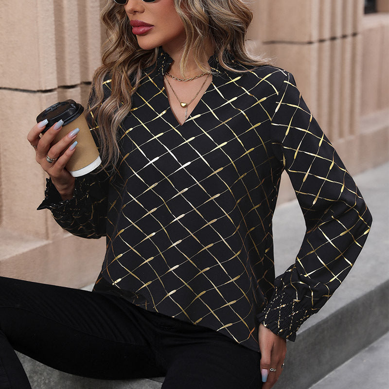 Women's blouse with elegant diamond pattern and puff sleeves, size