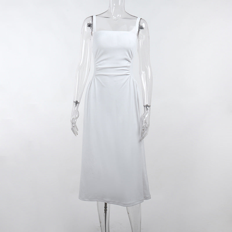 Women's elegant spaghetti strap midi dress with a figure-hugging silhouette and sophisticated draping, size [size]