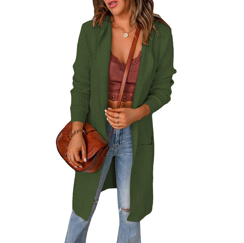 Women's knitted coat with deep V-neck and generous pockets, size
