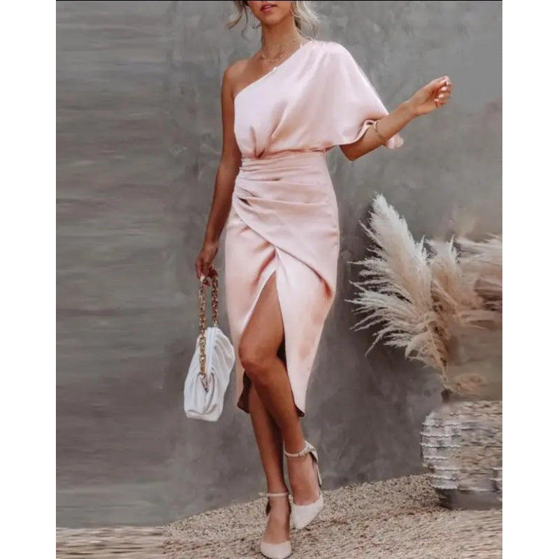 Women's chic, asymmetrical evening dress with an elegant slit and sophisticated draping, size GR