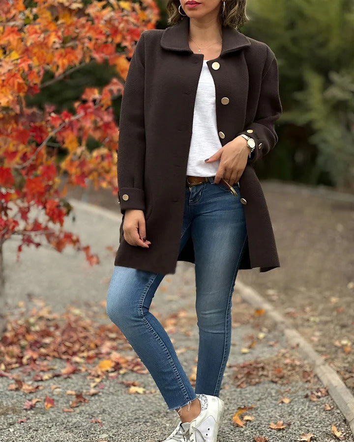 Women's comfortable oversized coat with large pockets and button details, size S
