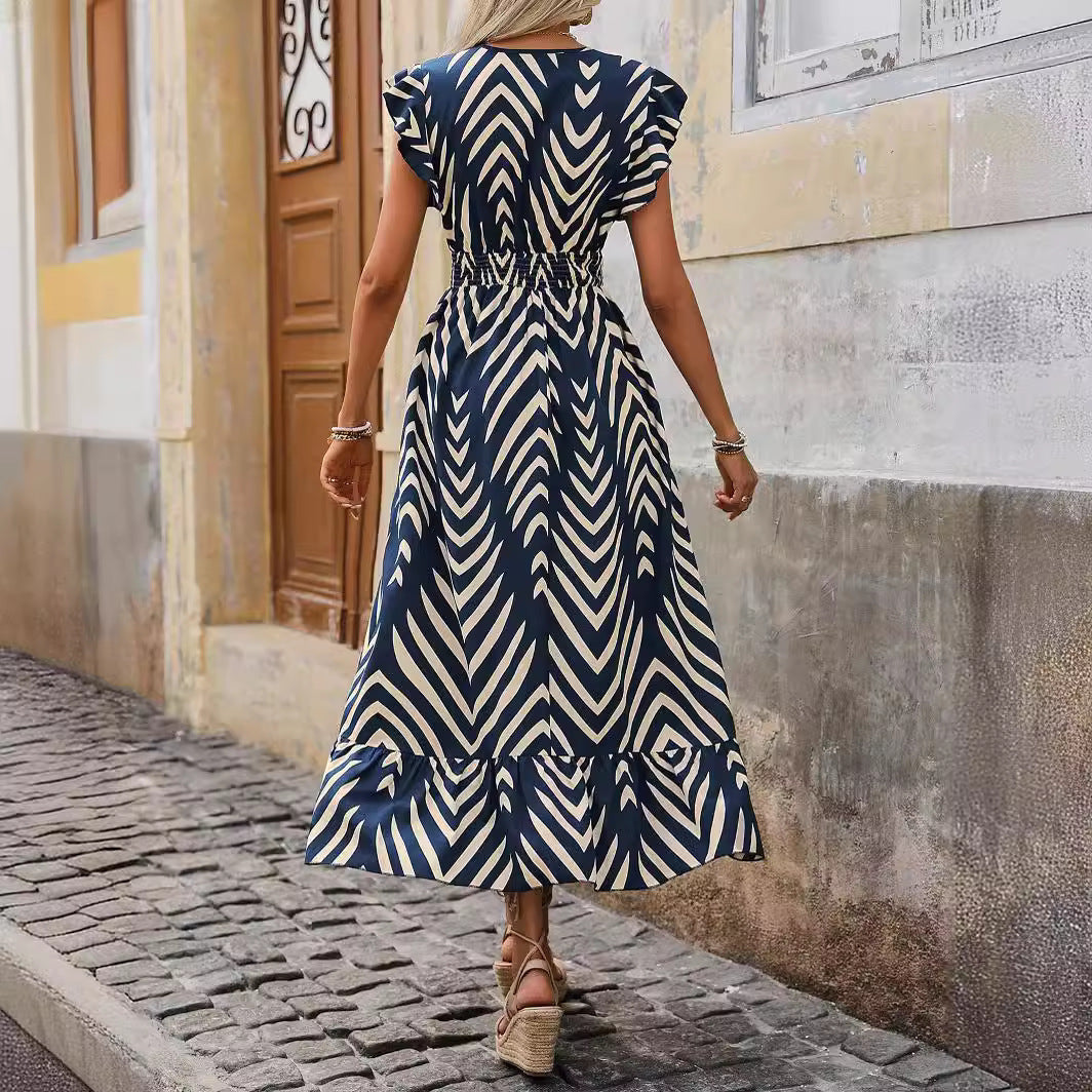 Women's midi dress with an attractive V-neck and elegant pleated skirt, size