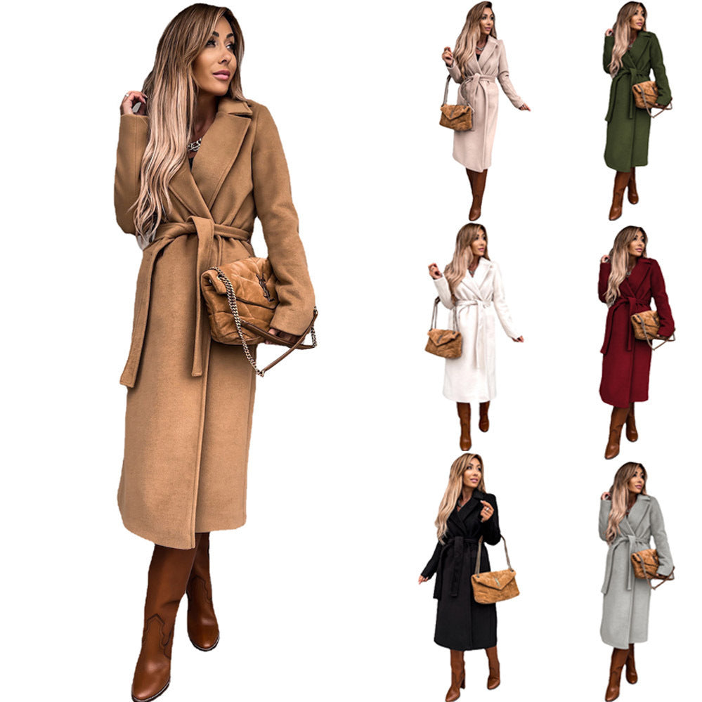 Women's elegant trench coat with tie belt and textured material, size S