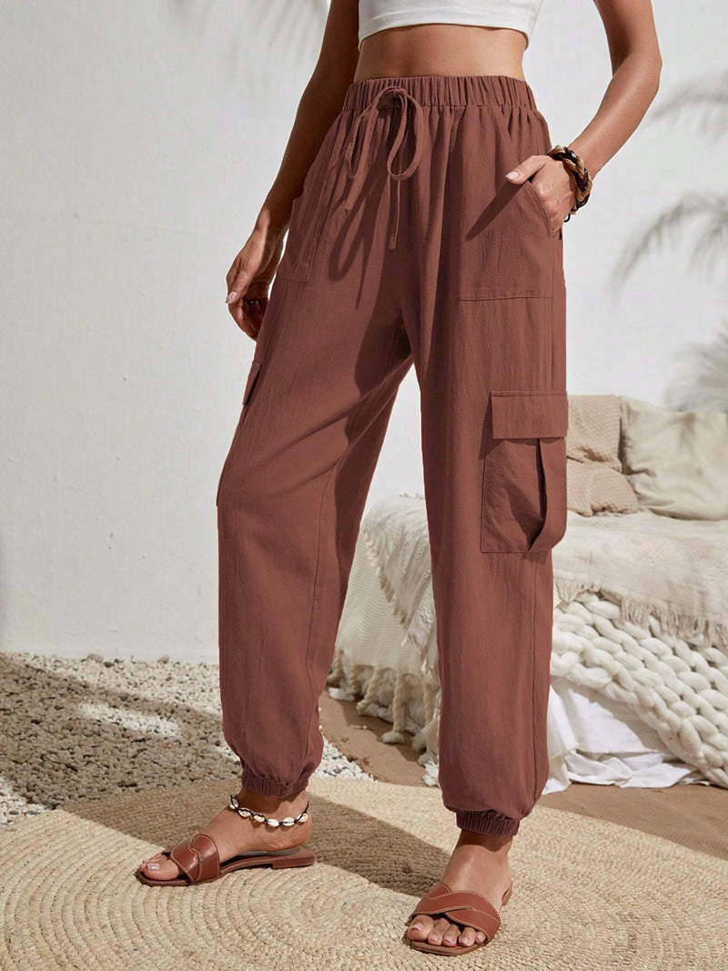 Women's cargo trousers with elasticated waistband and practical side pockets, size S