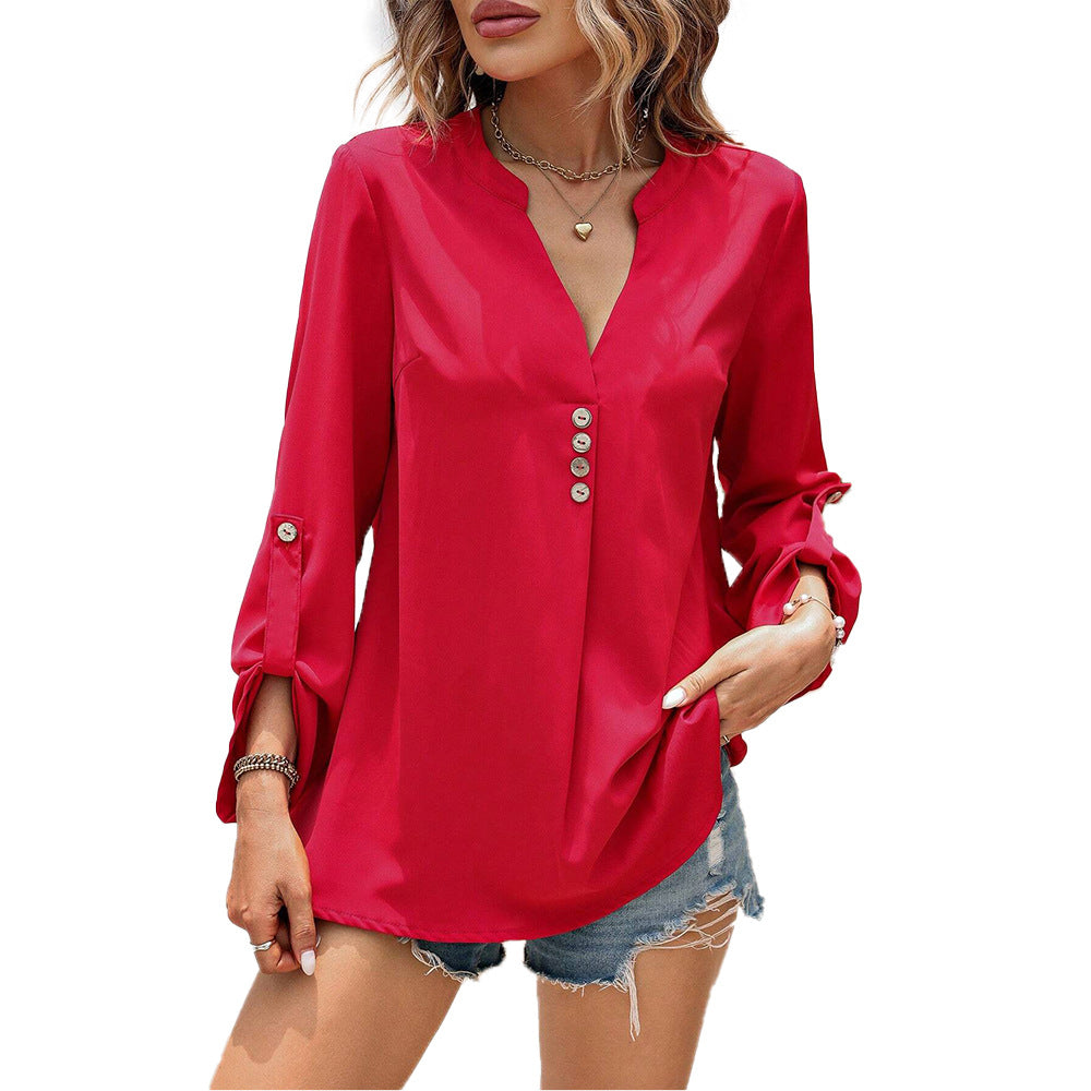 Women's blouse with elegant V-neck and refined button details, size