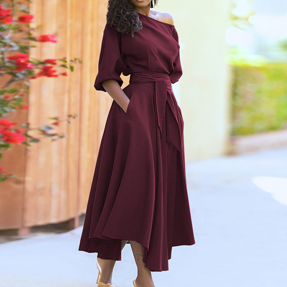 Women's elegant wrap dress with asymmetrical cut and practical pockets, size
