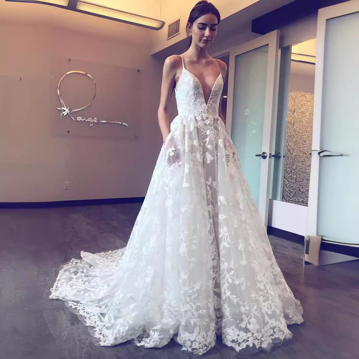 Women's wedding dress with deep V-neck and delicate lace, size