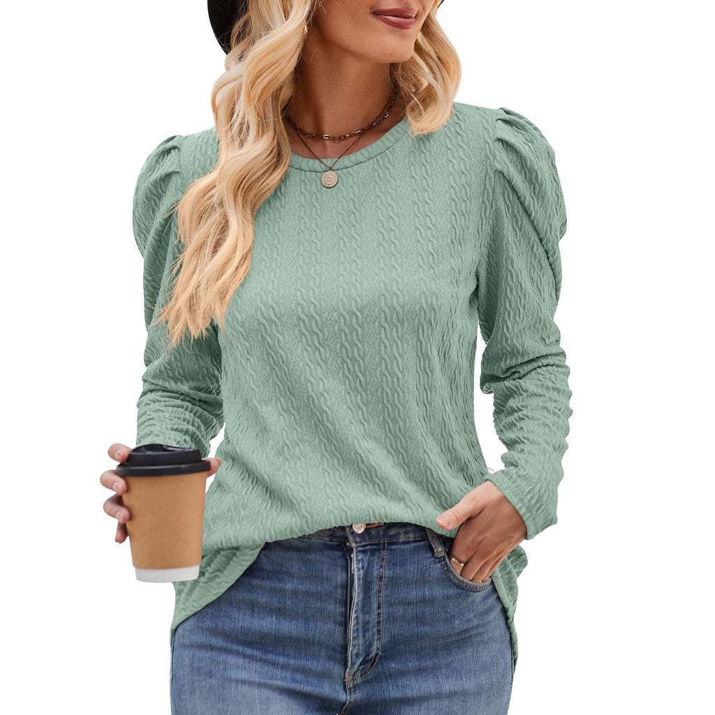 Women's elegant long-sleeved shirt with a textured pattern and puff sleeves, size
