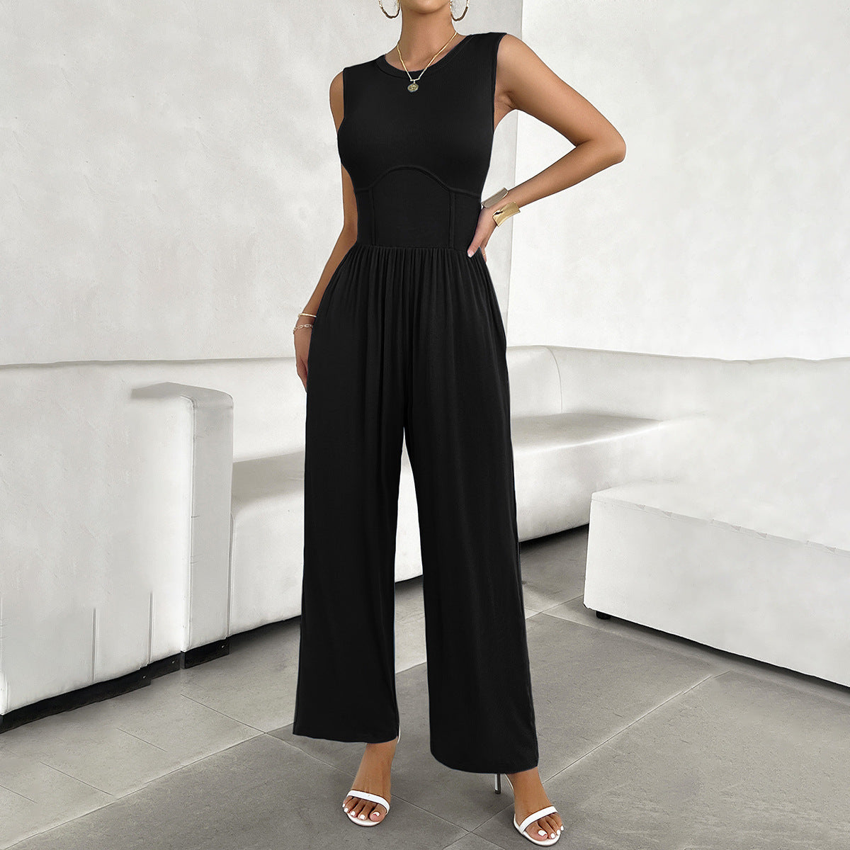 Women's elegant jumpsuit with a wide cut and figure-flattering design, size S