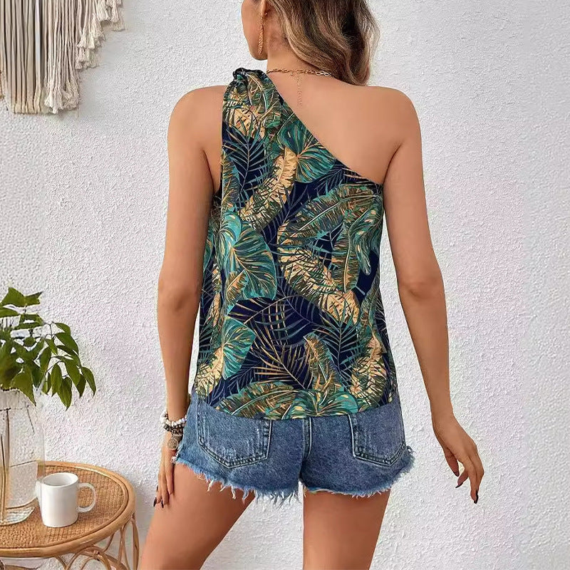 Women's asymmetrical top with elegant botanical print and chic bow detail, size GR
