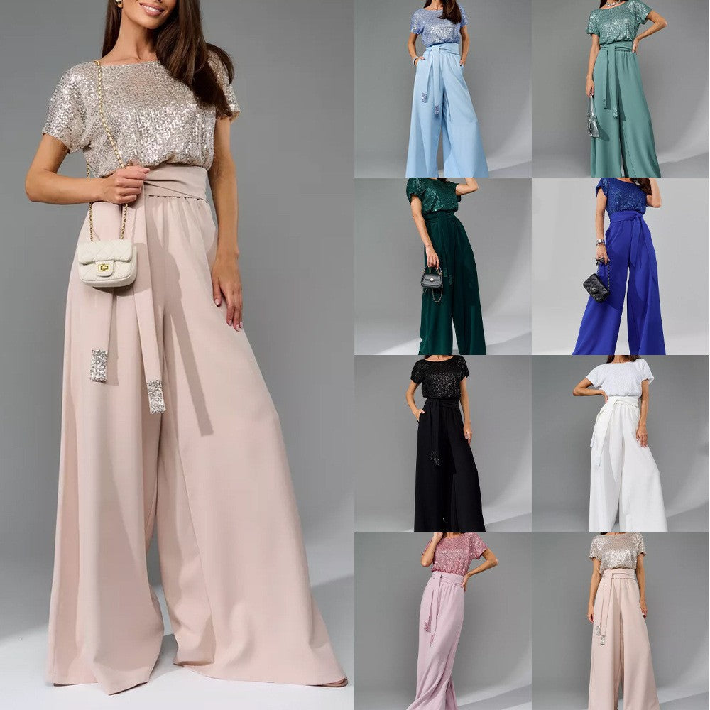 Women's glamorous jumpsuit with glittery top and wide-legged trousers, size