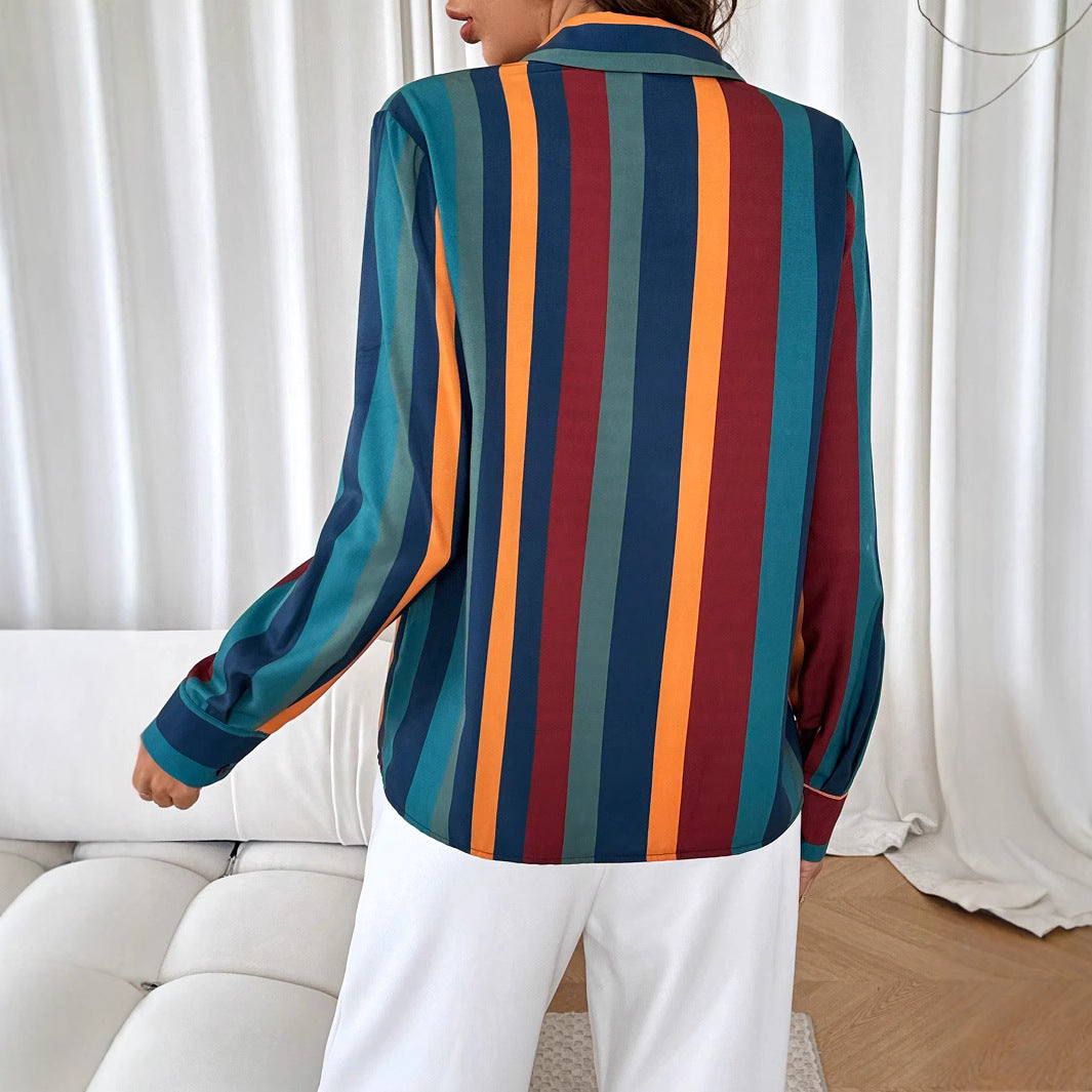 Women's blouse with colorful striped pattern and elegant button placket, size