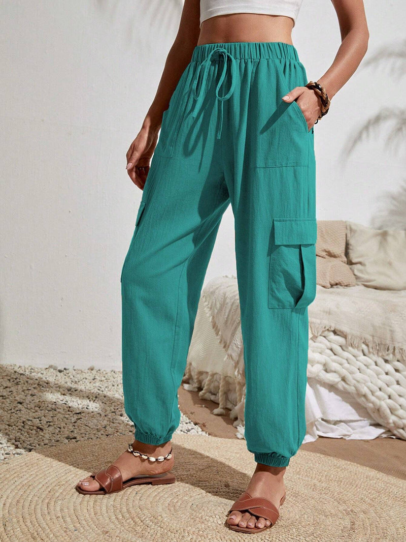 Women's cargo trousers with elasticated waistband and practical side pockets, size S