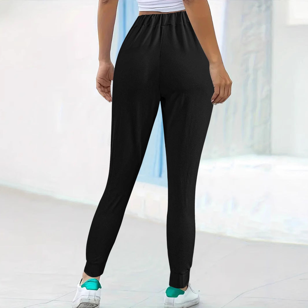 Women's comfortable jogging pants with elastic waistband and practical side pockets, size