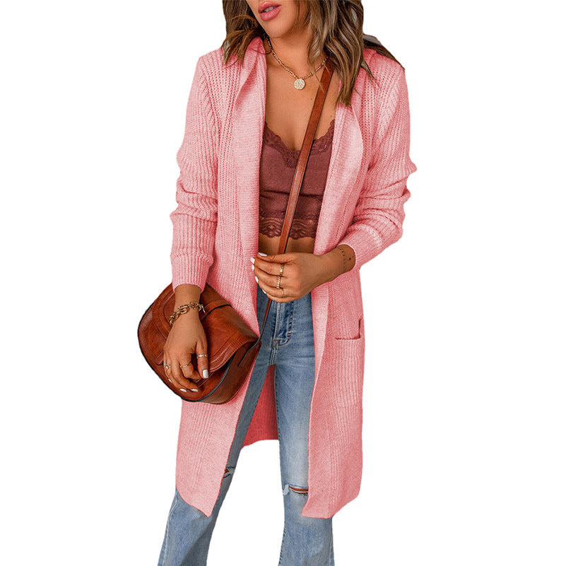 Women's knitted coat with deep V-neck and generous pockets, size