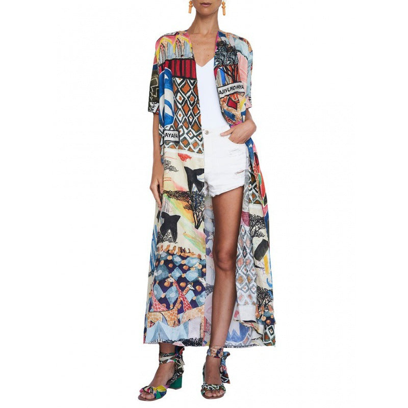 Women's kimono with colorful patchwork design and flowing fabric, size S