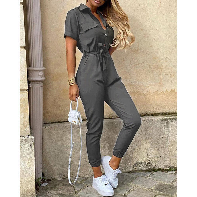 Women's figure-hugging short jumpsuit with button placket and adjustable belt, size S