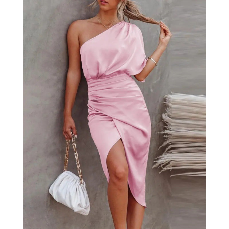 Women's chic, asymmetrical evening dress with an elegant slit and sophisticated draping, size GR
