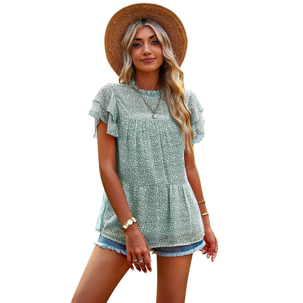 Women's flowy blouse with ruffle details and floral design, size