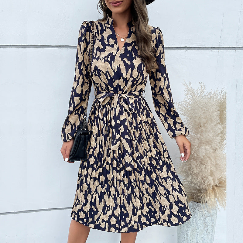 Women's midi dress with a tailored cut and fashionable tie belt, size S