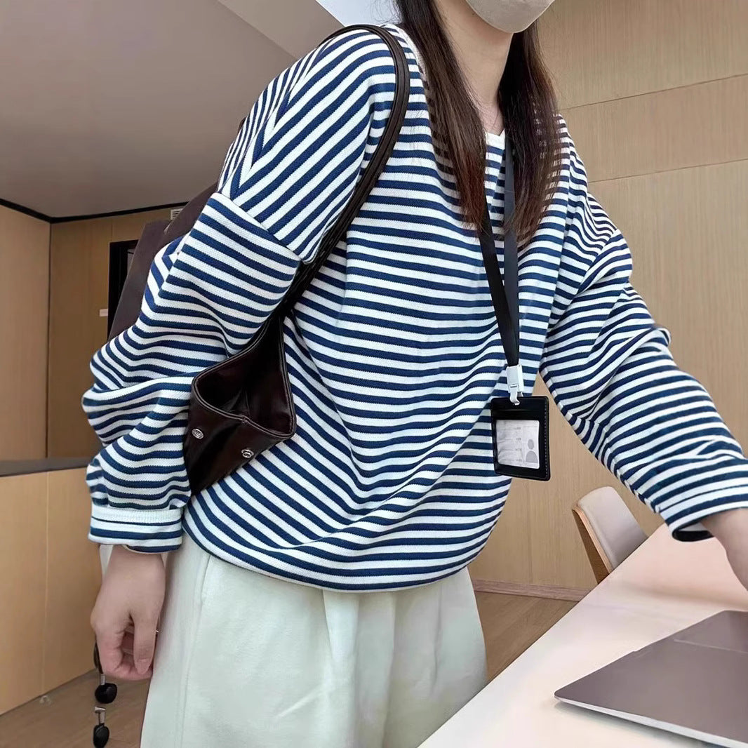 Women's casual striped sweater with colored accents, size
