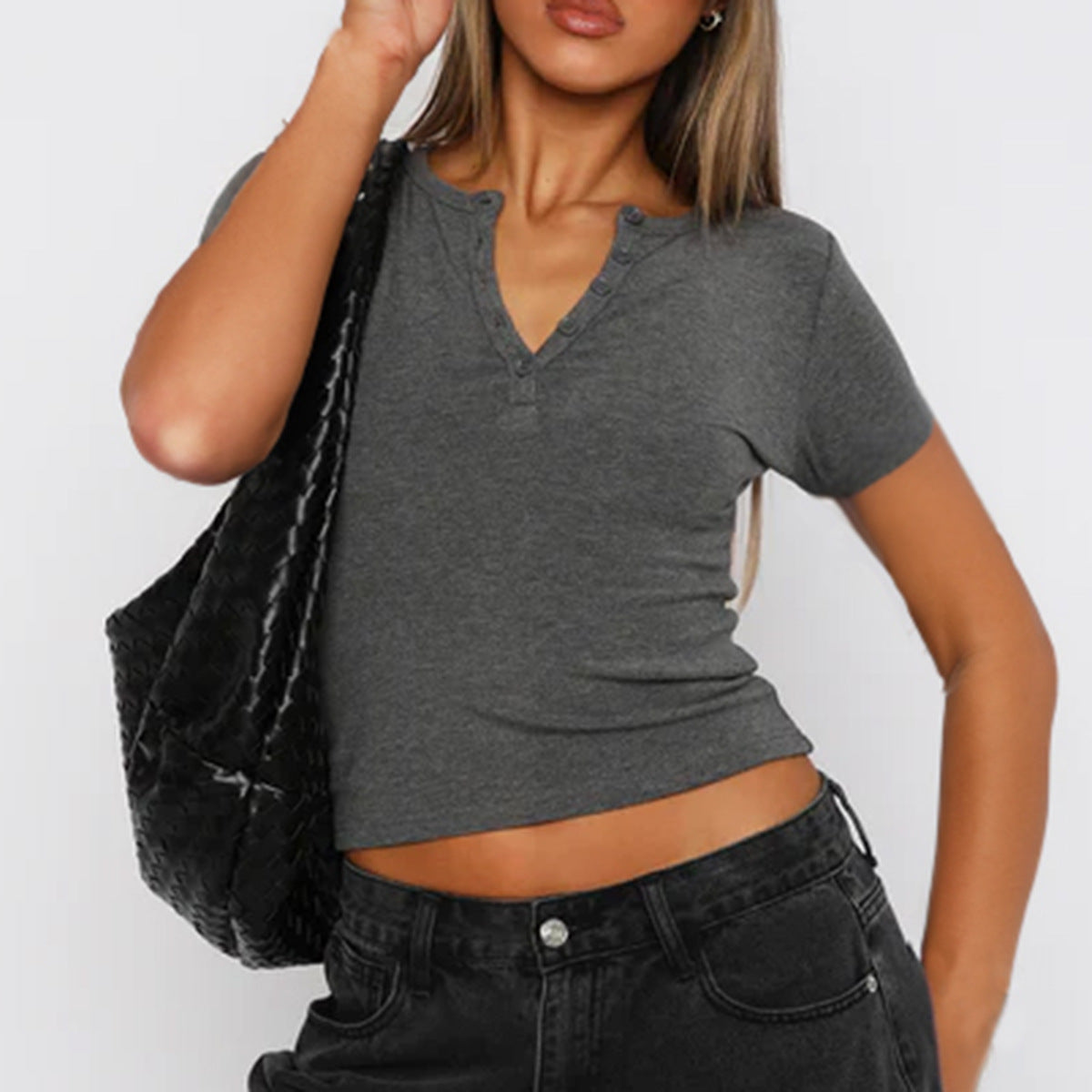 Women's figure-hugging cropped T-shirt with short sleeves and button placket, size [size missing]
