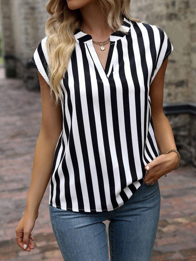 Women's blouse in an elegant striped design with a modern V-neck and short sleeves, size [size missing]