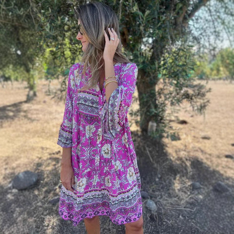 Women's boho-chic dress with floral patterns and button placket, size [size missing]