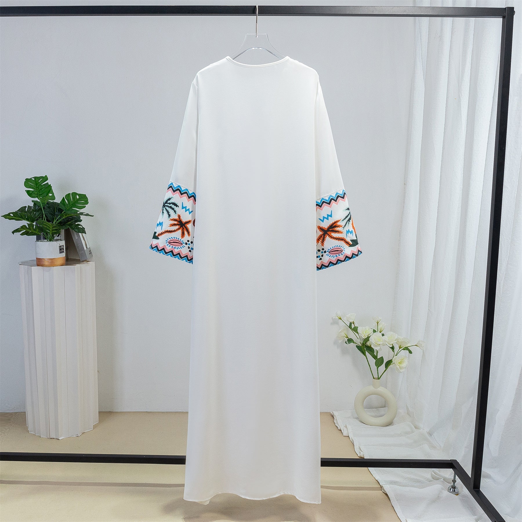 Women's elegant kaftan robe with artistic embroidered details, size