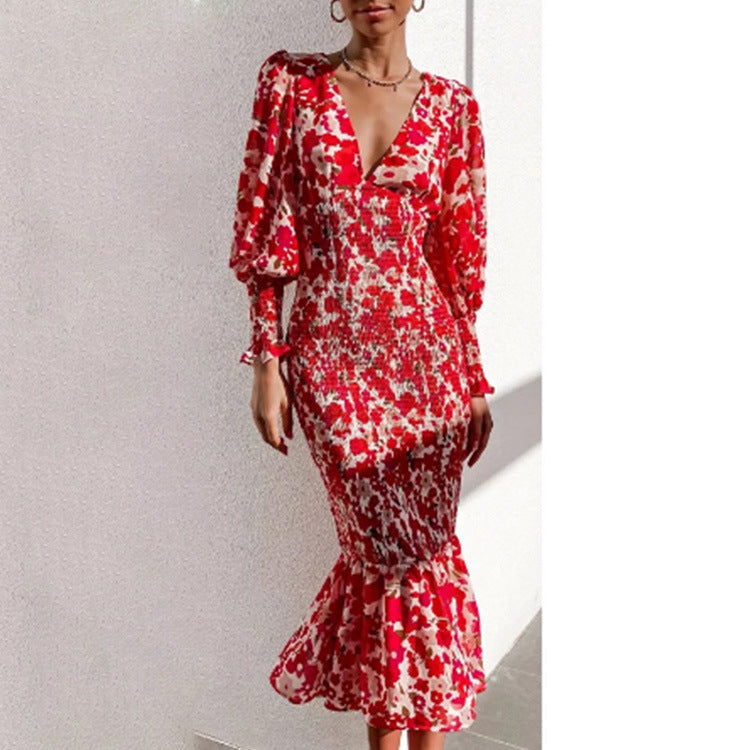 Women's floral print dress with voluminous sleeves, size [size missing]