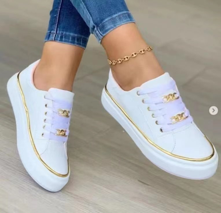 Women's sneakers with a fashionable satin upper and elegant gold accents, size GR