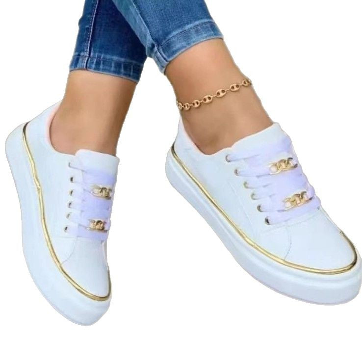 Women's sneakers with a fashionable satin upper and elegant gold accents, size GR