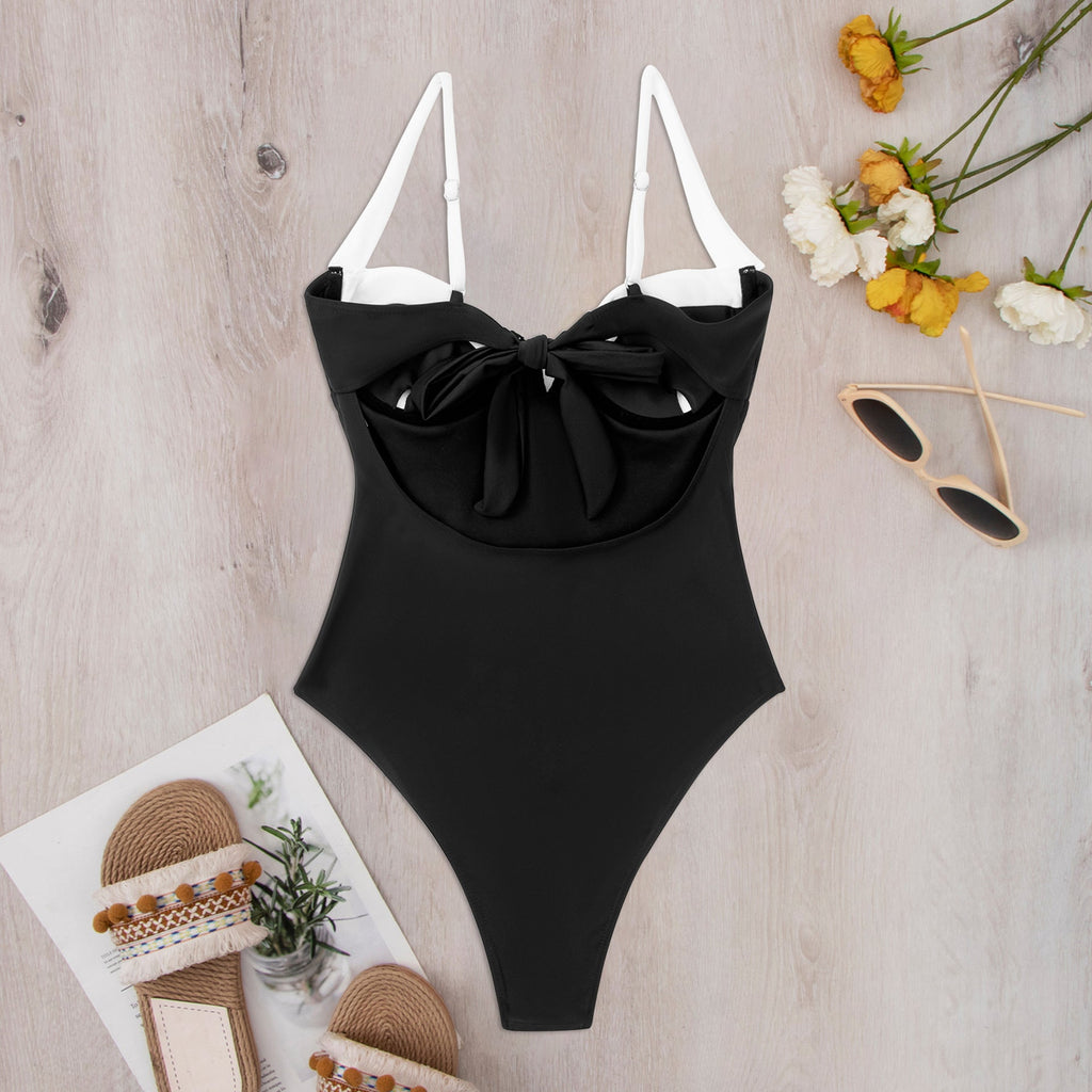 Women's one-piece swimsuit with elegant design and high-cut leg opening, size S
