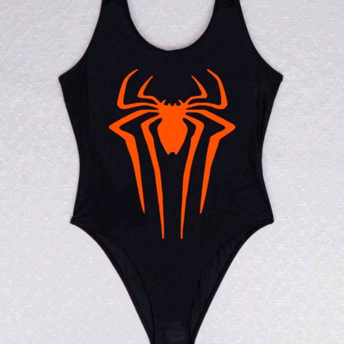 Women's swimsuit with stylish spider motif and high leg cut, size S
