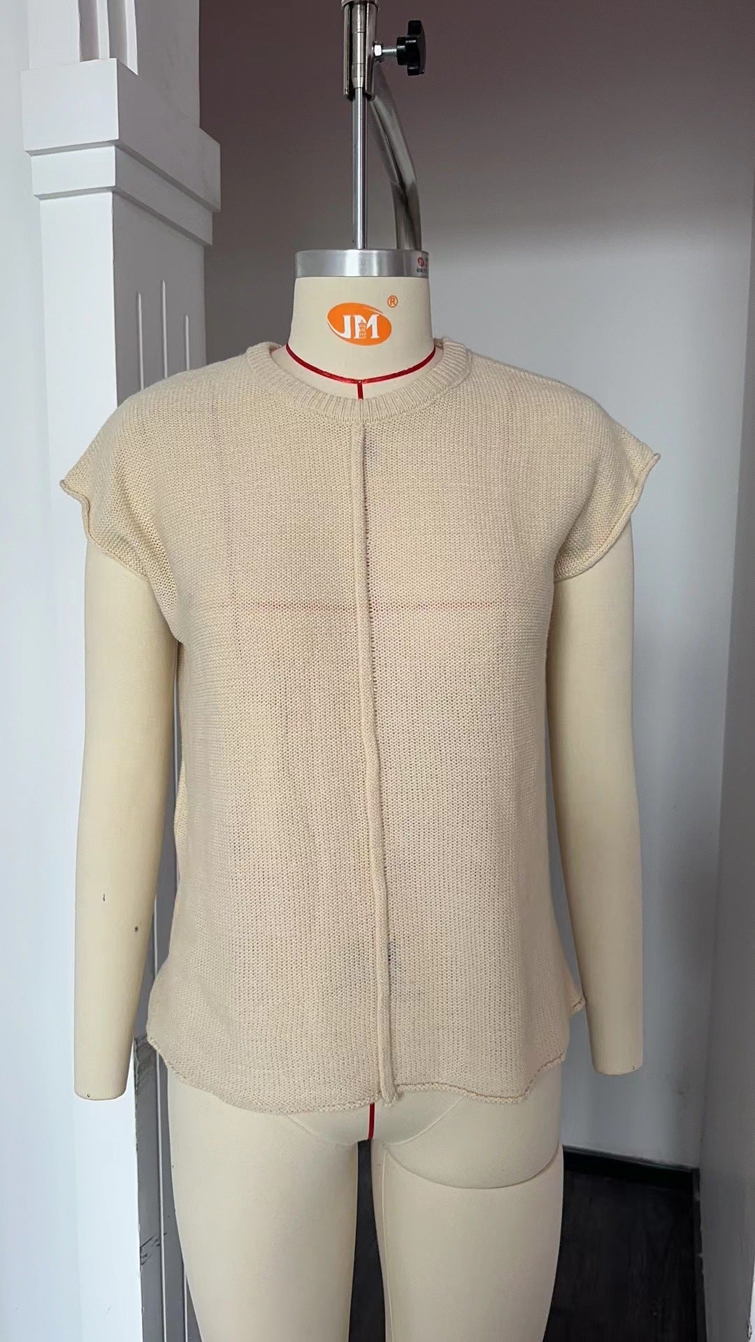 Women's casual short-sleeved knit top with a textured design, size GR