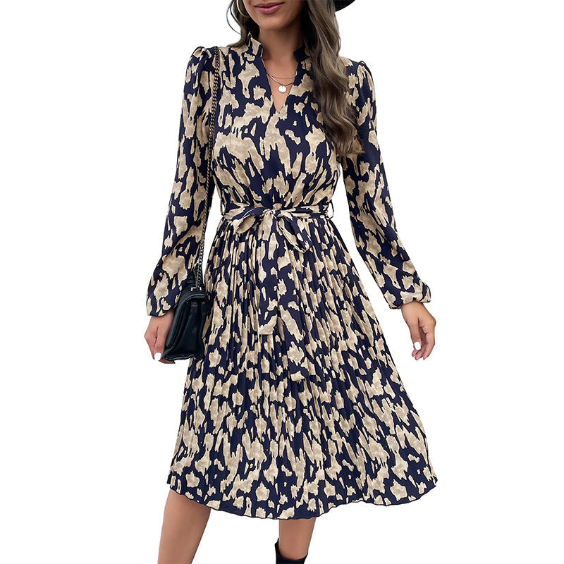 Women's midi dress with a tailored cut and fashionable tie belt, size S