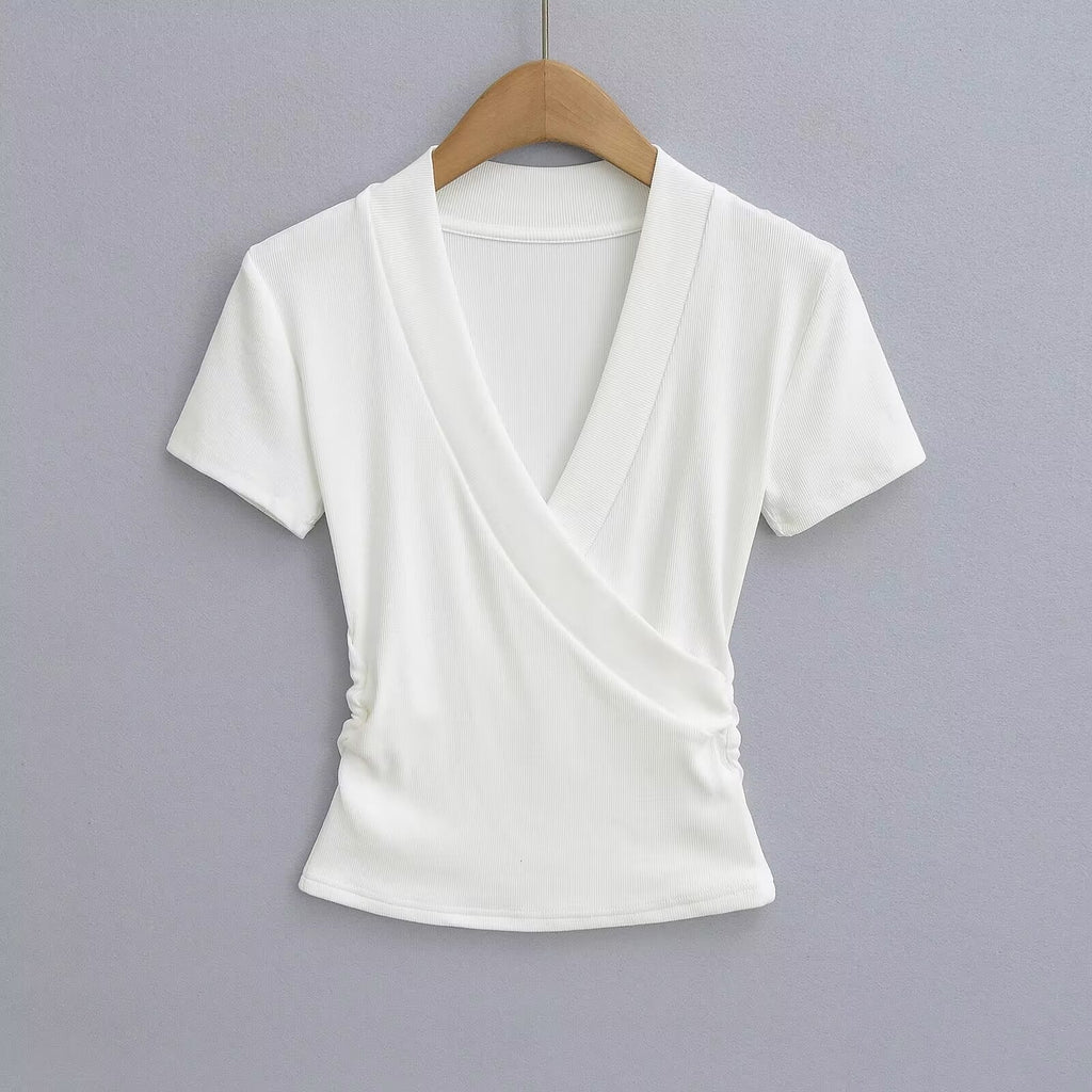 Women's wrap top with elegant V-neck and figure-flattering cut, size